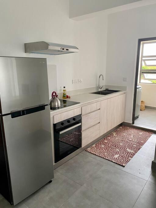 Sandstone Apartment A Walk To The Beach Flic en Flac Bagian luar foto